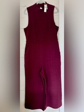 NWT Anthropologie Sleeveless Mock Neck Textured Jumpsuit - Burgundy. Size Large